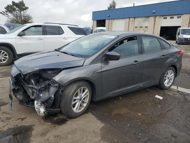FORD FOCUS SE 2018 with VIN 1FADP3F24JL258440 - Photo from auction