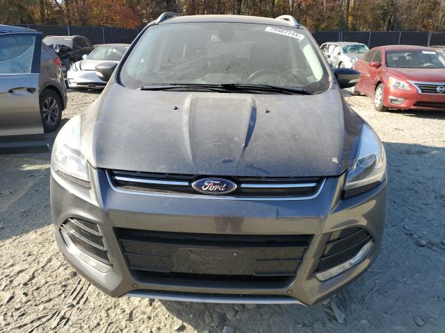 Photo 5 from auction – 2016 FORD ESCAPE TIT with VIN 1FMCU9J97GUB85374