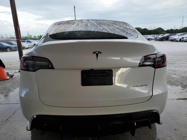 Photo 6 from auction – 2023 TESLA MODEL Y with VIN 7SAYGDEE3PF705383
