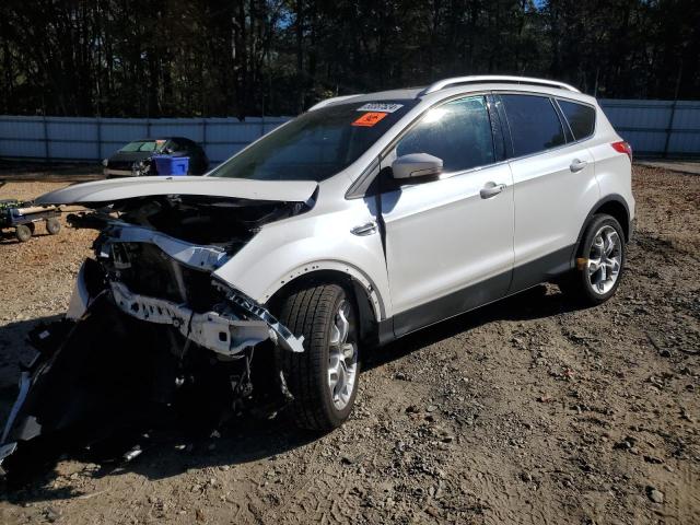 FORD ESCAPE TIT 2014 with VIN 1FMCU0JX5EUA89153 - Photo from auction