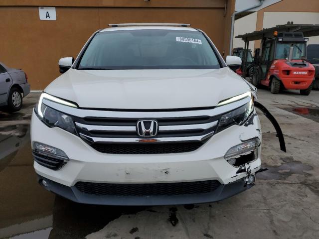 Photo 5 from auction – 2018 HONDA PILOT EXL with VIN 5FNYF6H57JB034721