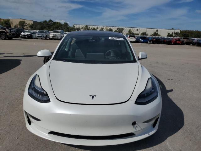 Photo 5 from auction – 2021 TESLA MODEL 3 with VIN 5YJ3E1EA4MF838500