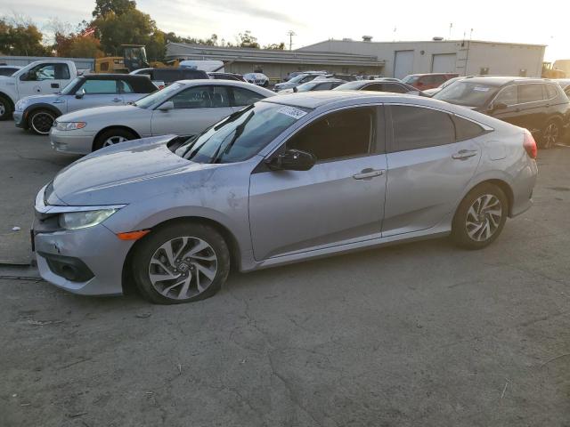 HONDA CIVIC EX 2018 with VIN 2HGFC2F88JH567422 - Photo from auction