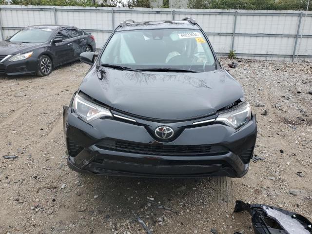 Photo 5 from auction – 2018 TOYOTA RAV4 LE with VIN 2T3BFREV8JW834577