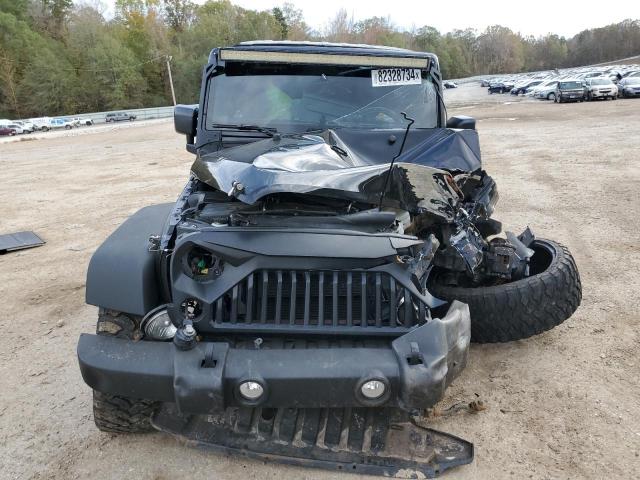 Photo 5 from auction – 2015 JEEP WRANGLER U with VIN 1C4BJWDG3FL555130