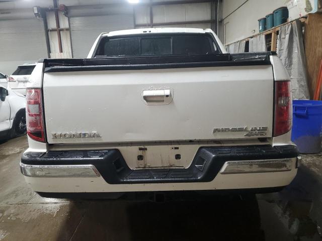 Photo 6 from auction – 2010 HONDA RIDGELINE with VIN 5FPYK1F52AB004082