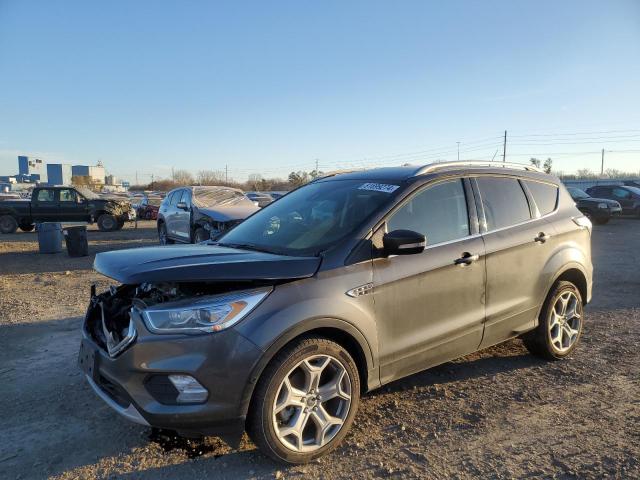 FORD ESCAPE TIT 2017 with VIN 1FMCU9J99HUC95411 - Photo from auction