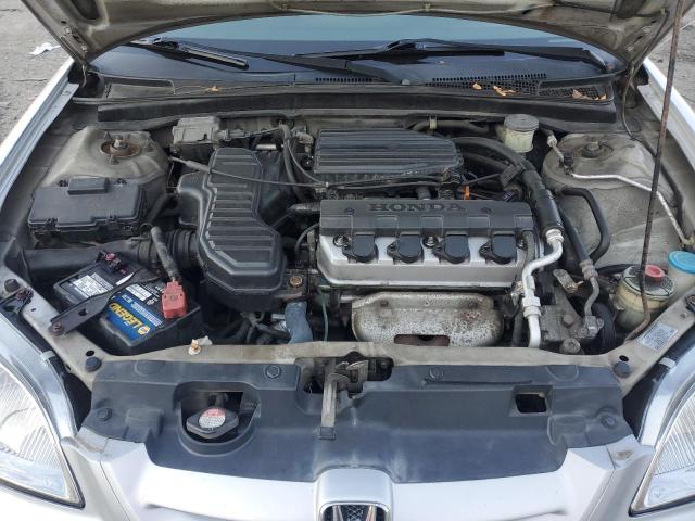 Photo 11 from auction – 2003 HONDA CIVIC LX with VIN 1HGEM22513L002746