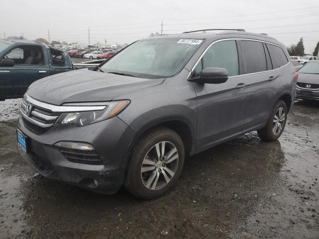 HONDA PILOT EXL 2016 with VIN 5FNYF6H84GB023338 - Photo from auction