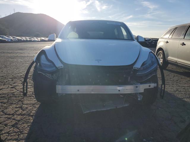 Photo 5 from auction – 2021 TESLA MODEL Y with VIN 5YJYGAEEXMF217622
