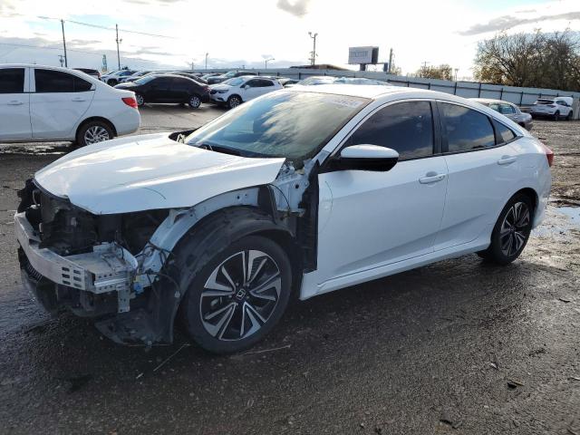 HONDA CIVIC EX 2018 with VIN JHMFC1F44JX022477 - Photo from auction