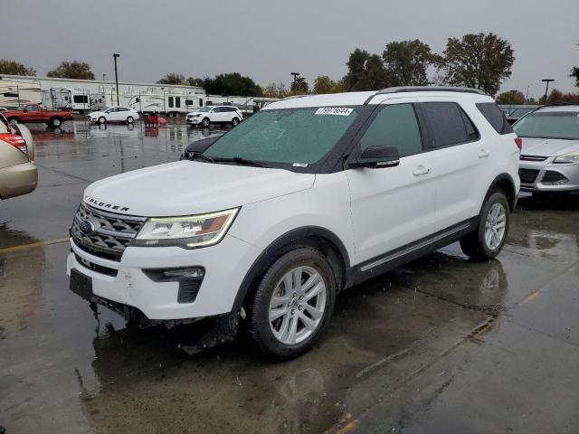 FORD EXPLORER X 2018 with VIN 1FM5K8DH5JGA69396 - Photo from auction