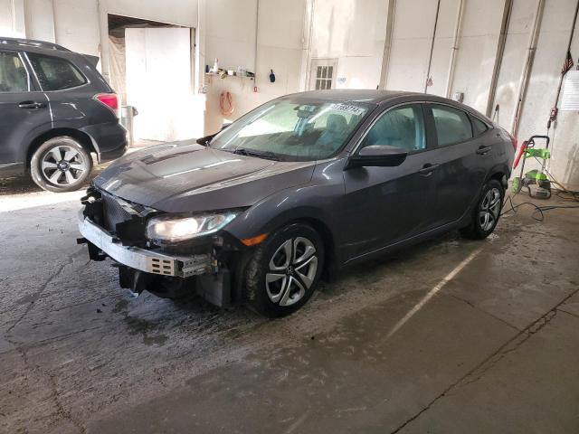 HONDA CIVIC LX 2017 with VIN 19XFC2F54HE017497 - Photo from auction