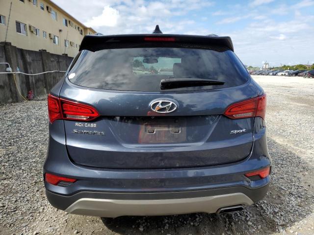 Photo 6 from auction – 2017 HYUNDAI SANTA FE S with VIN 5NMZU3LB9HH015926