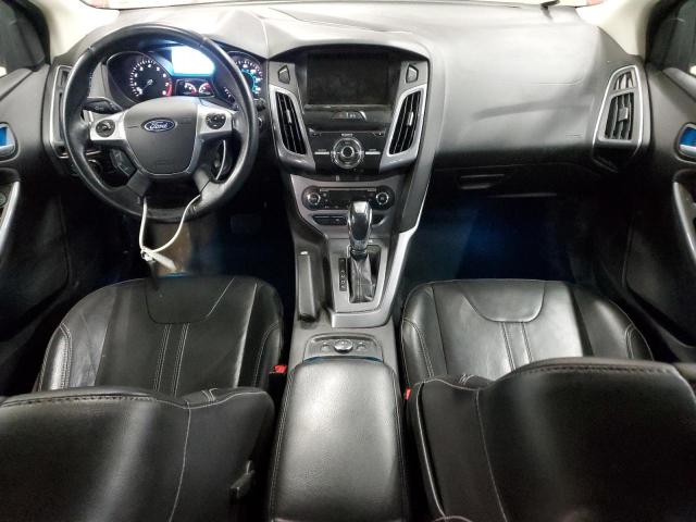 Photo 8 from auction – 2014 FORD FOCUS TITA with VIN 1FADP3N2XEL409238