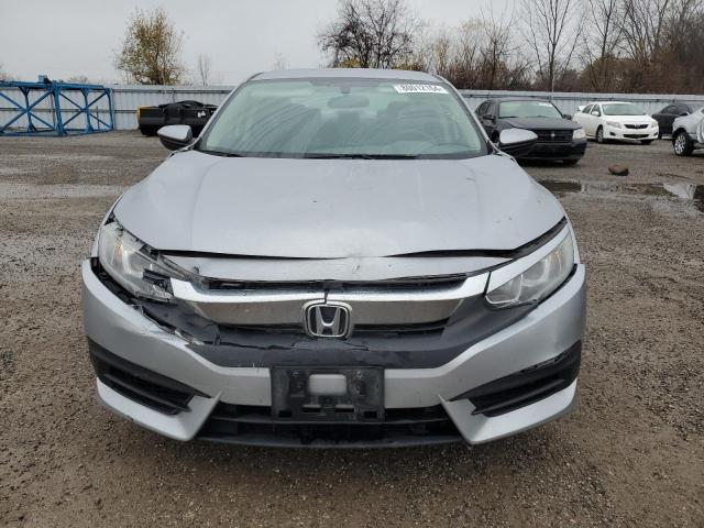 Photo 5 from auction – 2017 HONDA CIVIC LX with VIN 2HGFC2F52HH038273