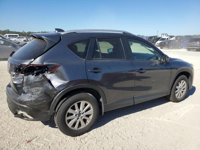 Photo 3 from auction – 2014 MAZDA CX-5 TOURI with VIN JM3KE2CY3E0424648