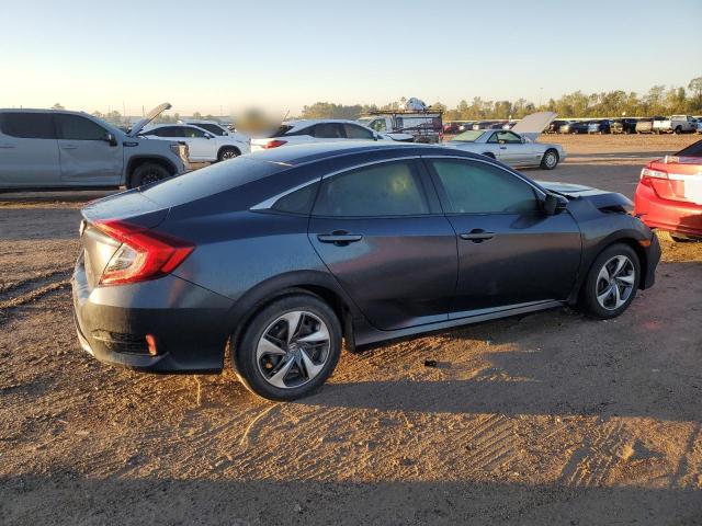 Photo 3 from auction – 2019 HONDA CIVIC LX with VIN 19XFC2F67KE040725