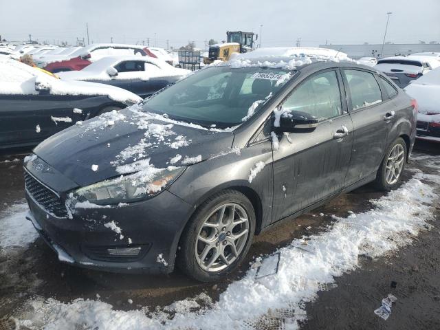 FORD FOCUS SE 2015 with VIN 1FADP3F20FL293872 - Photo from auction
