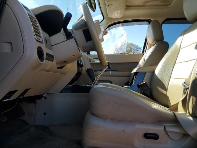 Photo 7 from auction – 2011 FORD ESCAPE LIM with VIN 1FMCU9E78BKB73408
