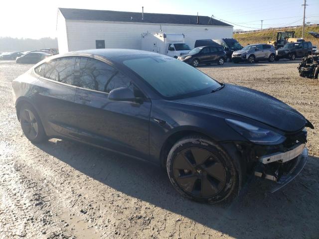 Photo 4 from auction – 2021 TESLA MODEL 3 with VIN 5YJ3E1EB7MF034989