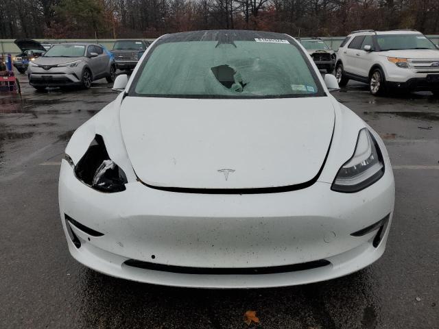 Photo 5 from auction – 2020 TESLA MODEL 3 with VIN 5YJ3E1EC5LF800287