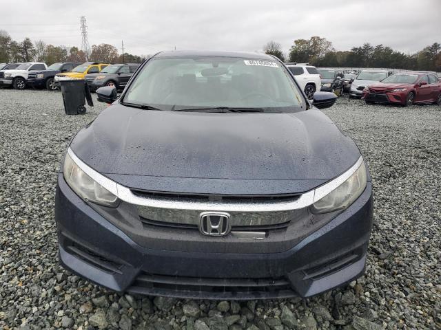 Photo 5 from auction – 2018 HONDA CIVIC COUP with VIN 19XFC2F7XJE017673