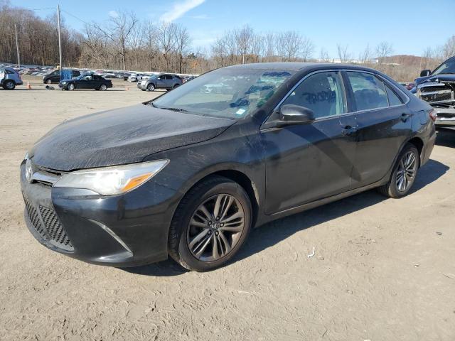 TOYOTA CAMRY LE 2017 with VIN 4T1BF1FK6HU693825 - Photo from auction