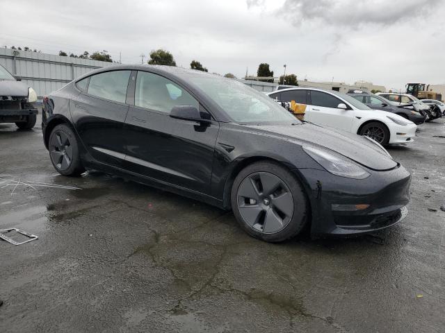 Photo 4 from auction – 2021 TESLA MODEL 3 with VIN 5YJ3E1EA1MF002207
