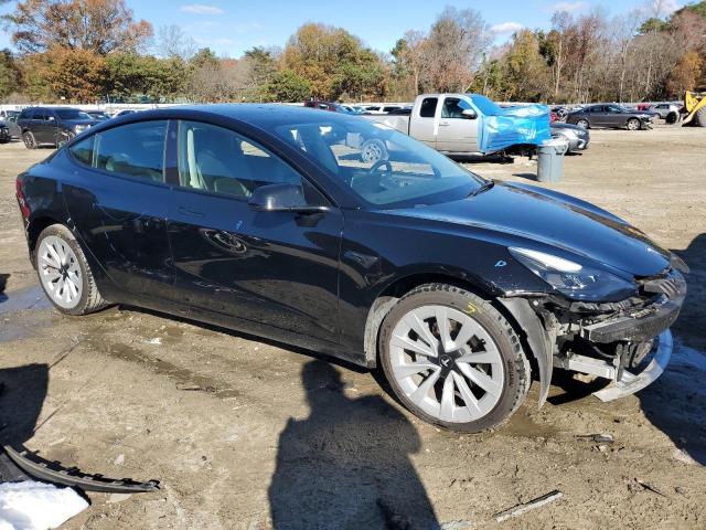 Photo 4 from auction – 2022 TESLA MODEL 3 with VIN 5YJ3E1EA4NF287017