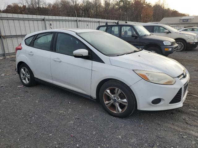 Foto 4 de la subasta – 2013 FORD FOCUS SE con VIN 1FADP3K22DL120941