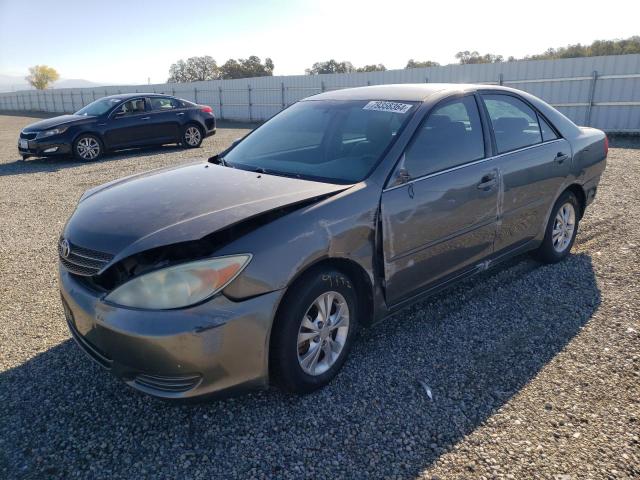 TOYOTA CAMRY LE 2004 with VIN 4T1BF32K64U579836 - Photo from auction