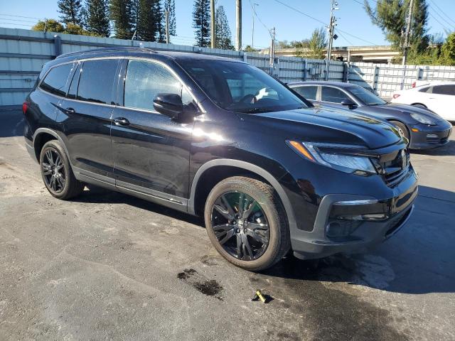 Photo 4 from auction – 2021 HONDA PILOT BLAC with VIN 5FNYF6H74MB003416