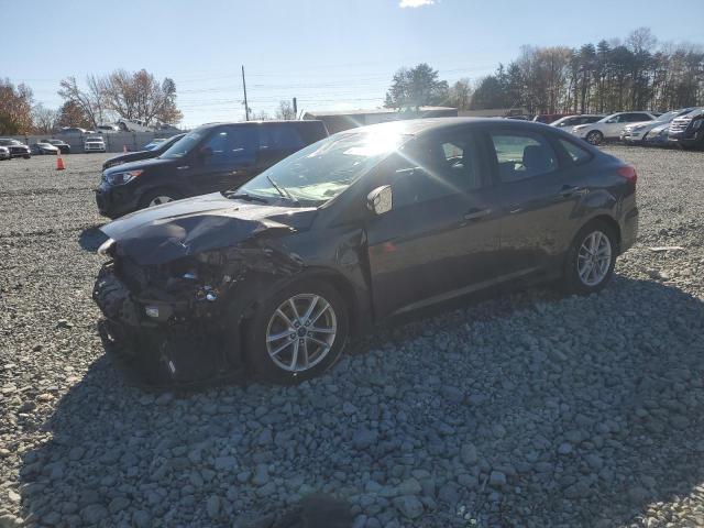 FORD FOCUS SE 2016 with VIN 1FADP3F26GL220555 - Photo from auction