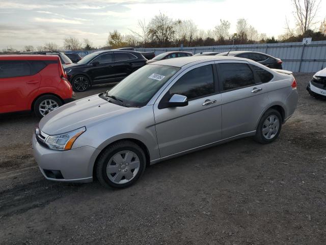 FORD FOCUS SE 2010 with VIN 1FAHP3FN0AW145496 - Photo from auction