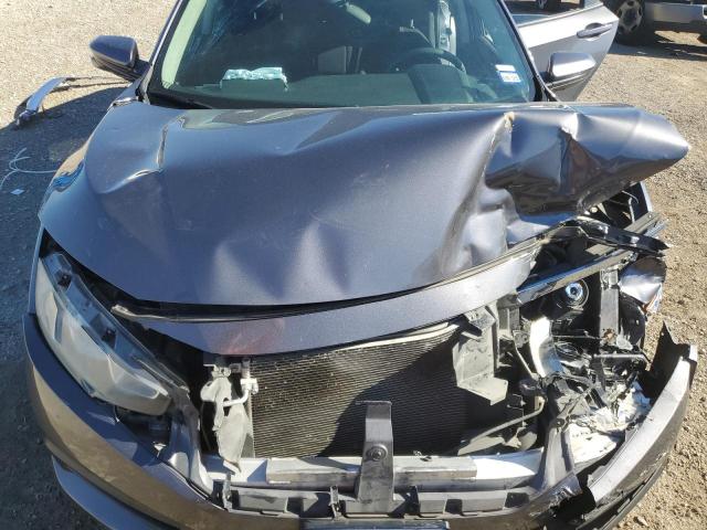 Photo 11 from auction – 2018 HONDA CIVIC EX with VIN 2HGFC2F76JH605432