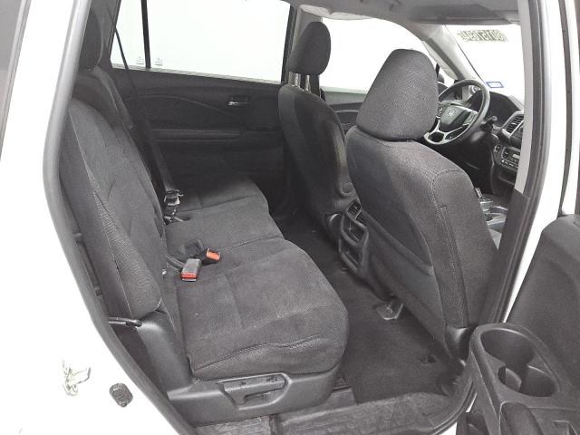 Photo 11 from auction – 2021 HONDA PILOT LX with VIN 5FNYF5H14MB005625