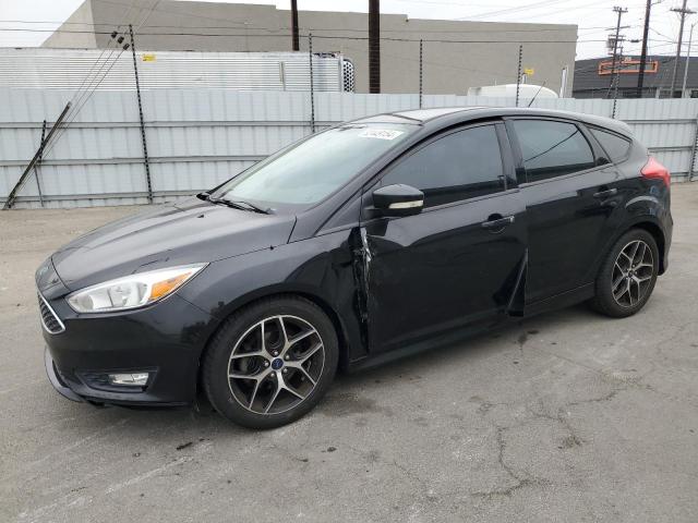 FORD FOCUS SE 2015 with VIN 1FADP3K2XFL385724 - Photo from auction