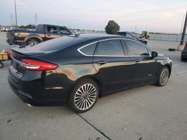 Photo 3 from auction – 2018 FORD FUSION TIT with VIN 3FA6P0RU4JR147277