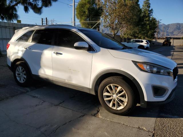 Photo 4 from auction – 2016 KIA SORENTO LX with VIN 5XYPG4A36GG181426