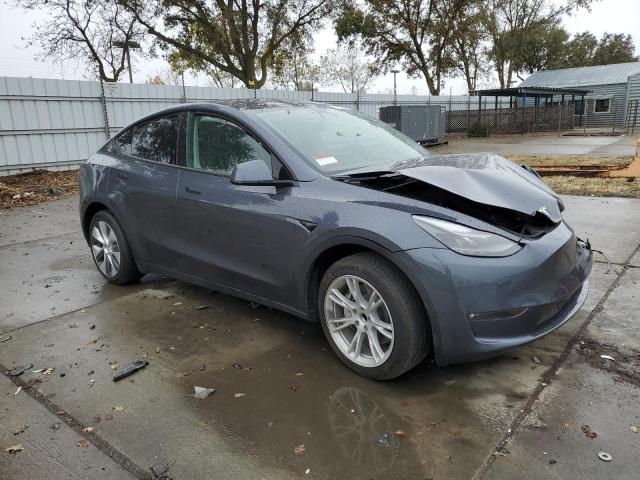 Photo 4 from auction – 2023 TESLA MODEL Y with VIN 7SAYGDED5PF949477