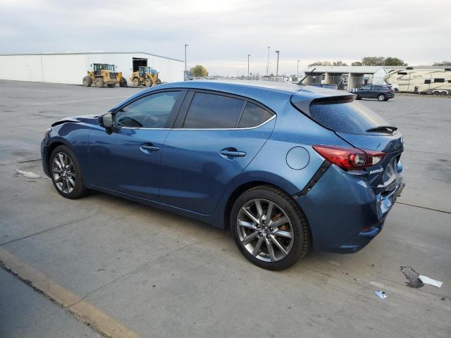 Photo 2 from auction – 2018 MAZDA 3 TOURING with VIN 3MZBN1L30JM209658