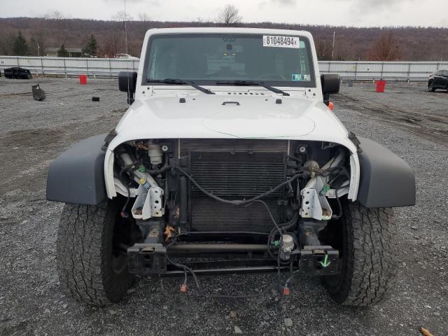 Photo 5 from auction – 2015 JEEP WRANGLER U with VIN 1C4BJWDG6FL692952