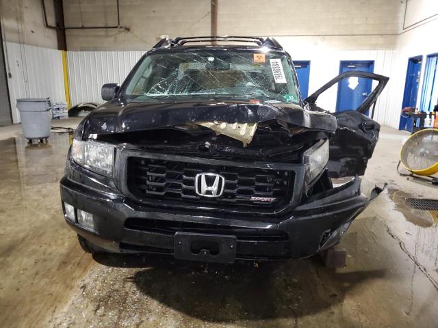 Photo 5 from auction – 2014 HONDA RIDGELINE with VIN 5FPYK1F72EB007054