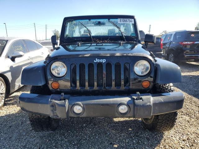 Photo 5 from auction – 2011 JEEP WRANGLER U with VIN 1J4BA3H15BL579132