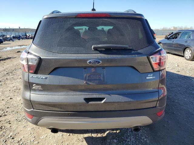 Photo 6 from auction – 2018 FORD ESCAPE SE with VIN 1FMCU9GD6JUC63078