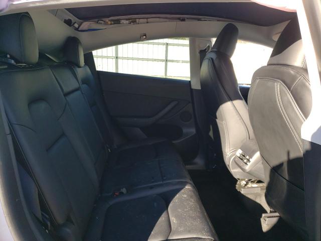 Photo 10 from auction – 2023 TESLA MODEL Y with VIN 7SAYGAEE5PF703911