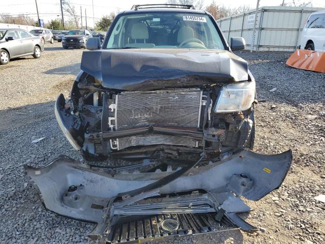 Photo 5 from auction – 2009 MERCURY MARINER with VIN 4M2CU91749KJ25449