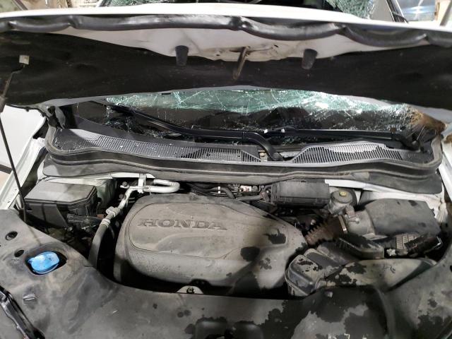 Photo 12 from auction – 2021 HONDA PILOT SE with VIN 5FNYF6H20MB098822