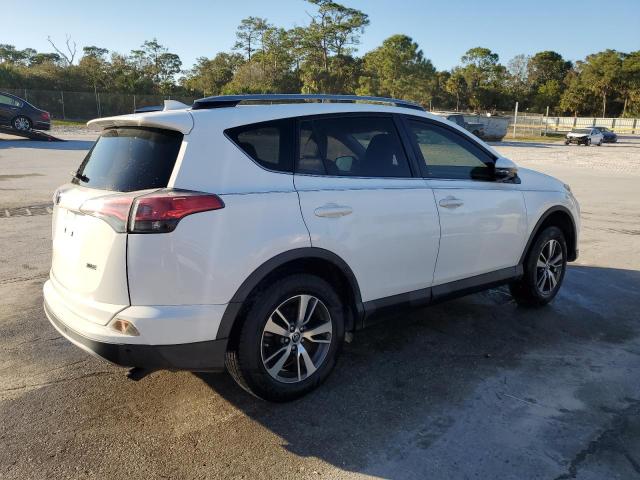 Photo 3 from auction – 2017 TOYOTA RAV4 XLE with VIN JTMWFREV1HD099157